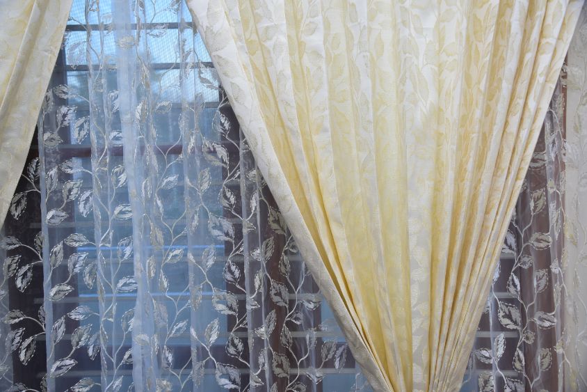 Close view of ivory lace curtains